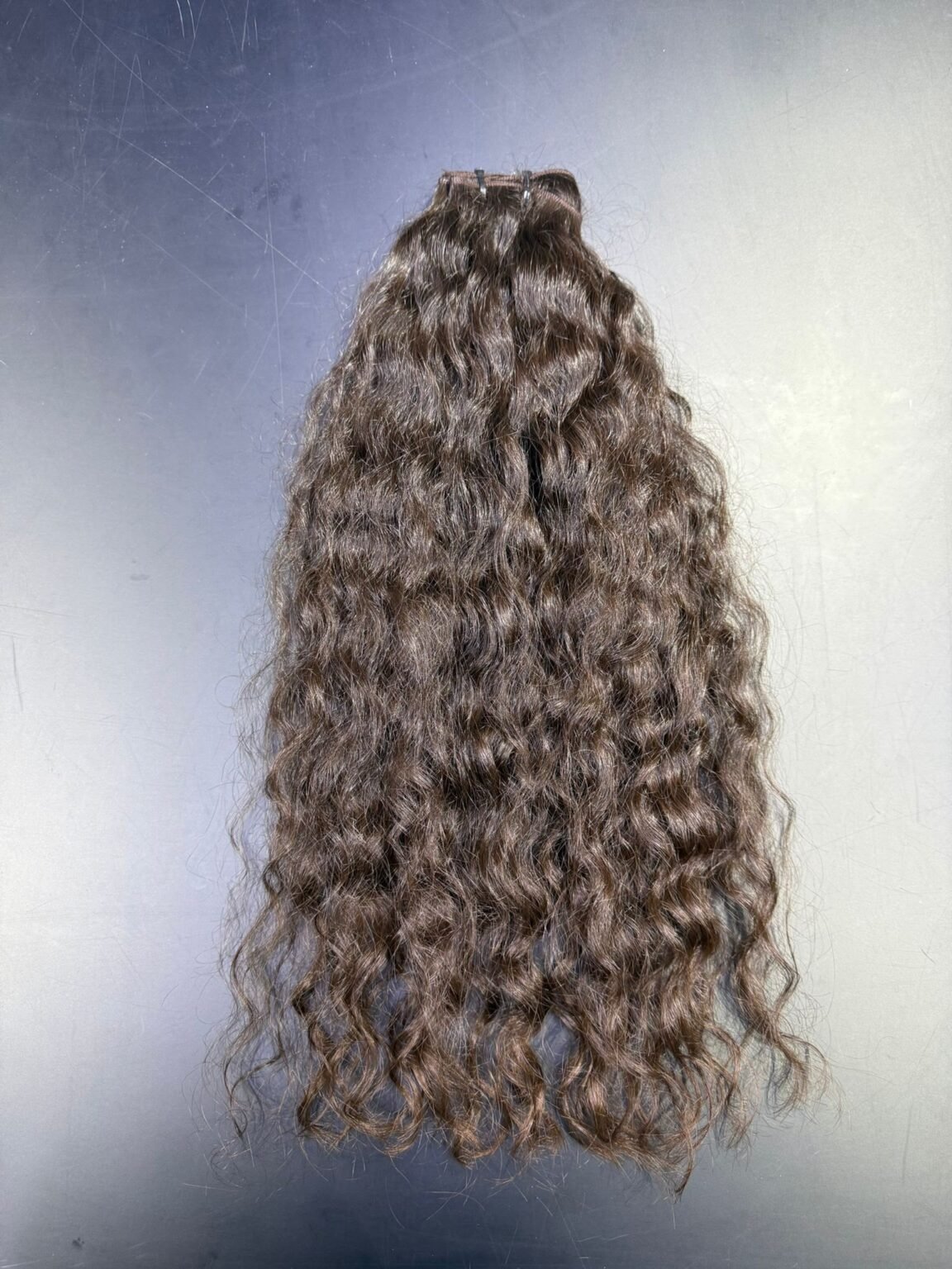 Sew-in beaded weave hair extensions London